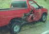 three smashed up vehicles